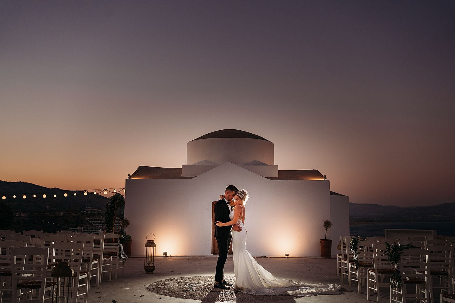 Beautiful flash portrait of sunset wedding photo at Ktima Lindos Rhodes